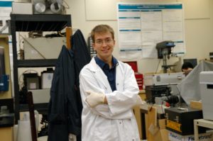 Francis in lab coat